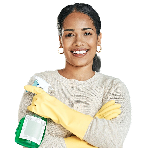 Cleaner holding a spray bottle and smiling